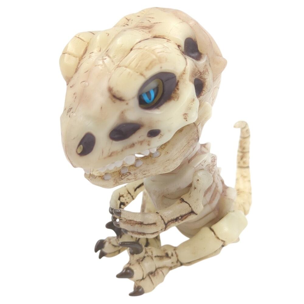 WowWee Fingerlings Doom Raptor Dinosaur T-Rex Bone Monster Toy Blue Eyes